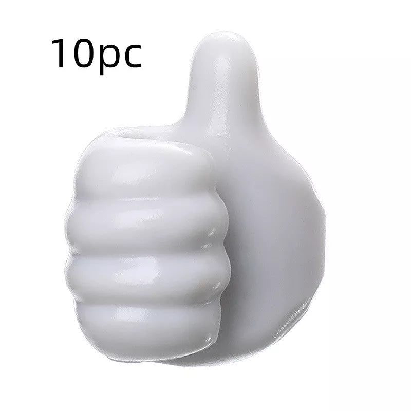 Silicone thumb wall hooks in various colors for organizing kitchen and bathroom items