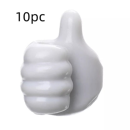 Silicone thumb wall hooks in various colors for organizing kitchen and bathroom items