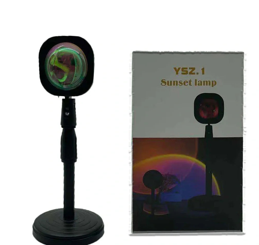 Rechargeable sunset projection lamp showing red and rainbow colours on wall