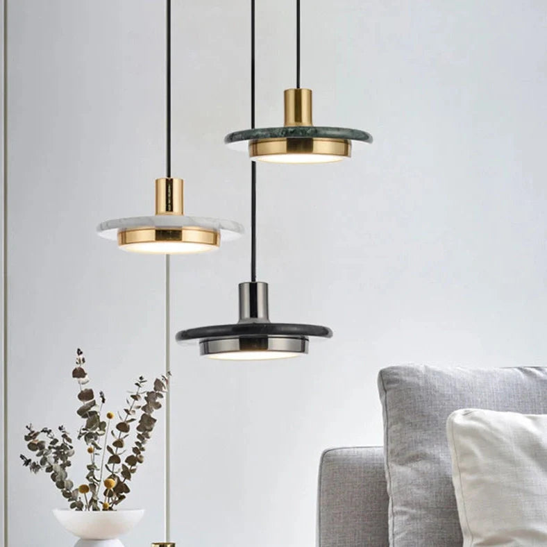 Nordic round marble chandelier with adjustable height suspended from ceiling