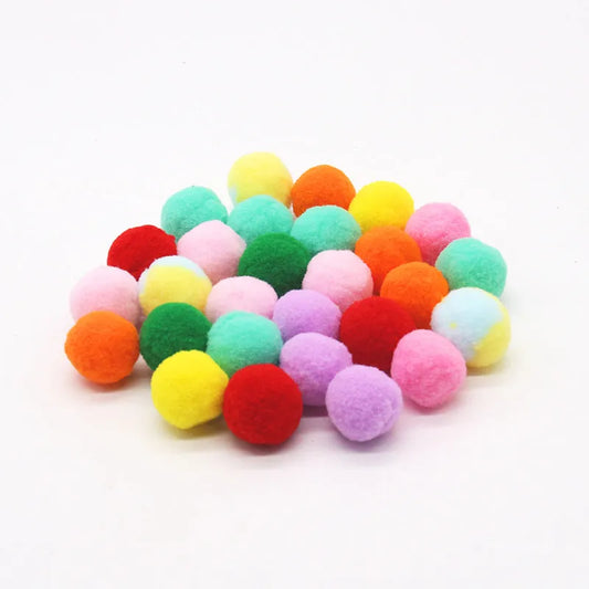 Interactive plastic pet toy gun and soft plush yarn balls on a carpet for fetch games.