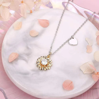 925 silver sunflower necklace with adjustable chain showing geometric daisy pendant design and cross chain detail