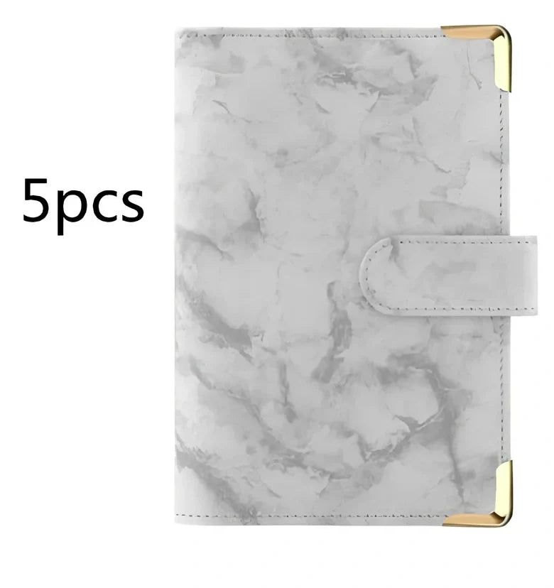 A6 leather PU binder journal open showing colour budget sheets and zip pockets with spiral binding