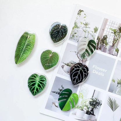Stylish leaf-inspired smartphone stand with secure grip and adjustable viewing angle for hands-free use