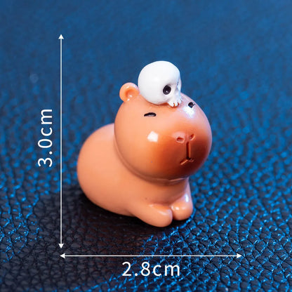 Eight Halloween character capybara resin decorations including pumpkin, zombie and vampire designs