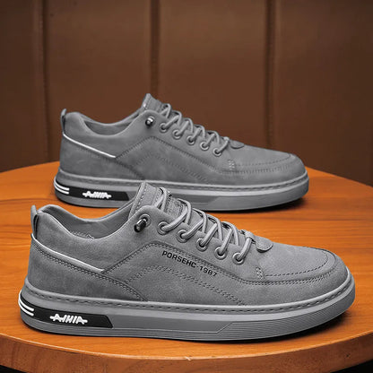 Men's khaki waterproof casual shoes with round toe and rubber sole for work and leisure.