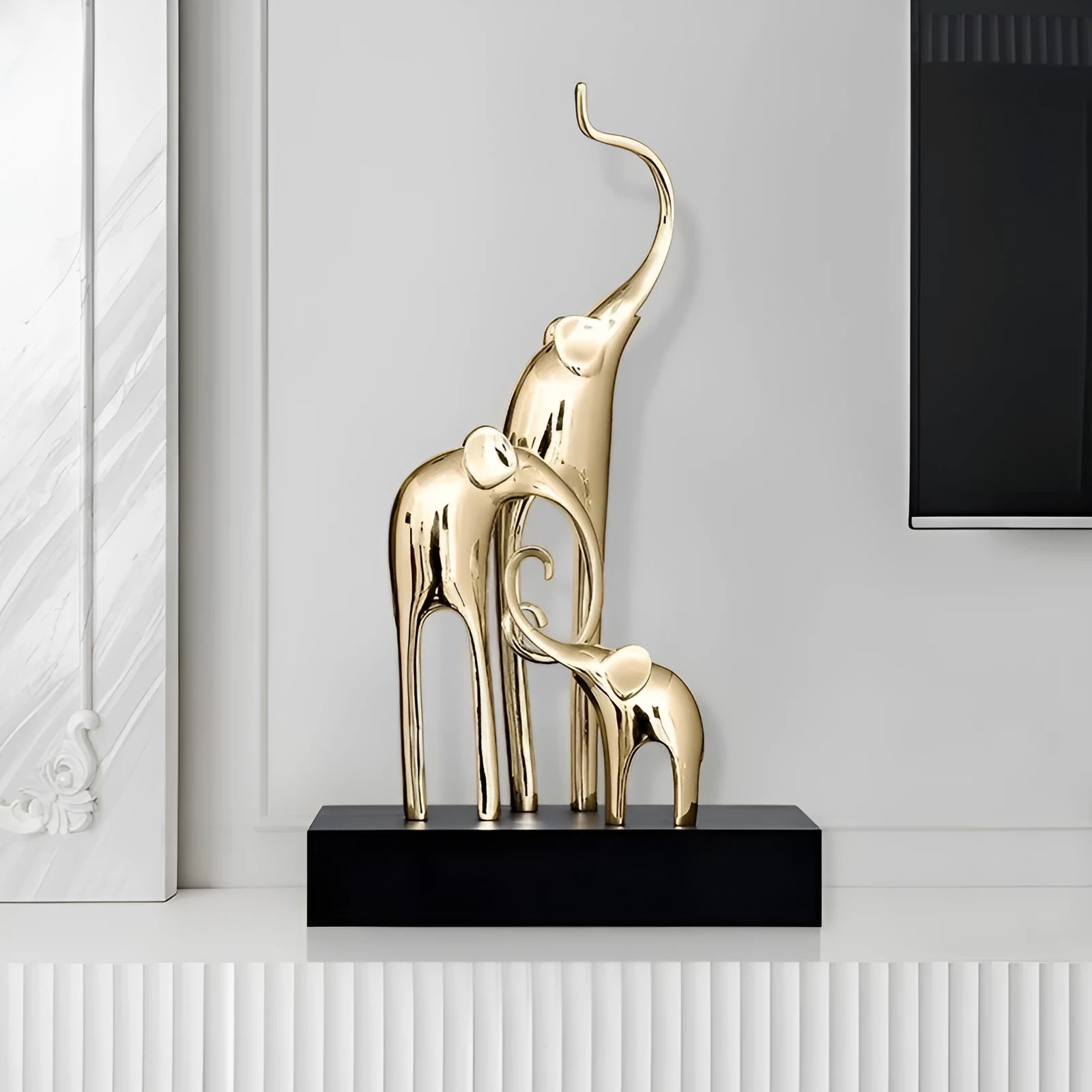 Fortune Bring Elephant resin decorative figurine in gold finish, 15cm tall on a wooden surface.