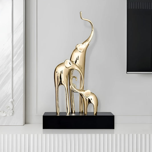 Fortune Bring Elephant resin decorative figurine in gold finish, 15cm tall on a wooden surface.