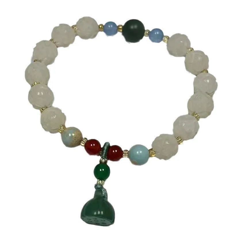 White Bodhi root bracelet with carved pumpkin lotus beads including Apple Orchard and Duobao styles
