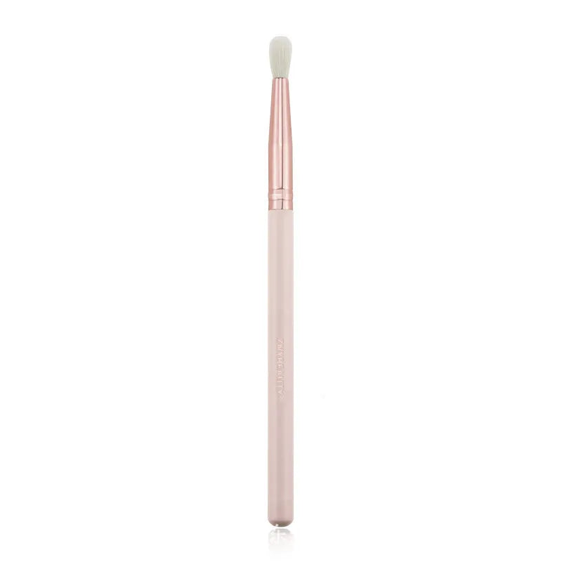 26 pink makeup brushes with wool bristles and wooden handles arranged in a PU zip bag.