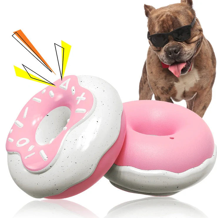Pink donut-shaped dog toy with textured surface for dental cleaning, showing 118mm diameter