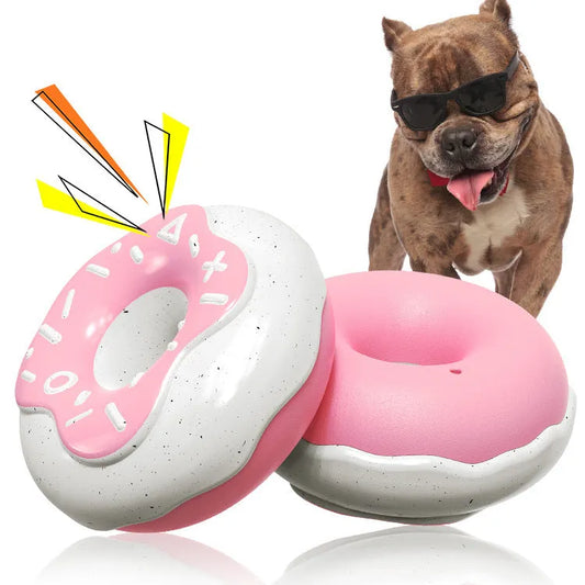 Pink donut-shaped dog toy with textured surface for teeth cleaning, showing 118mm diameter
