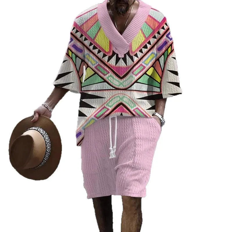 Man wearing a loose blue short sleeve suit jacket and matching casual shorts.