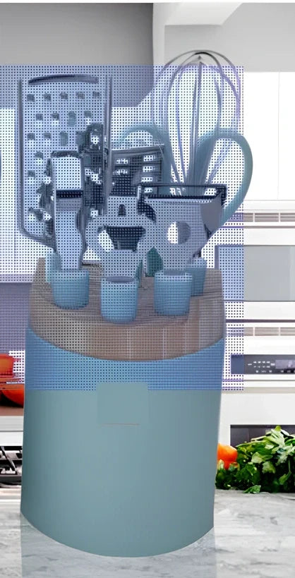 Stainless steel kitchen utensil set with whisk, grater, peeler, scissors and other tools on grey background