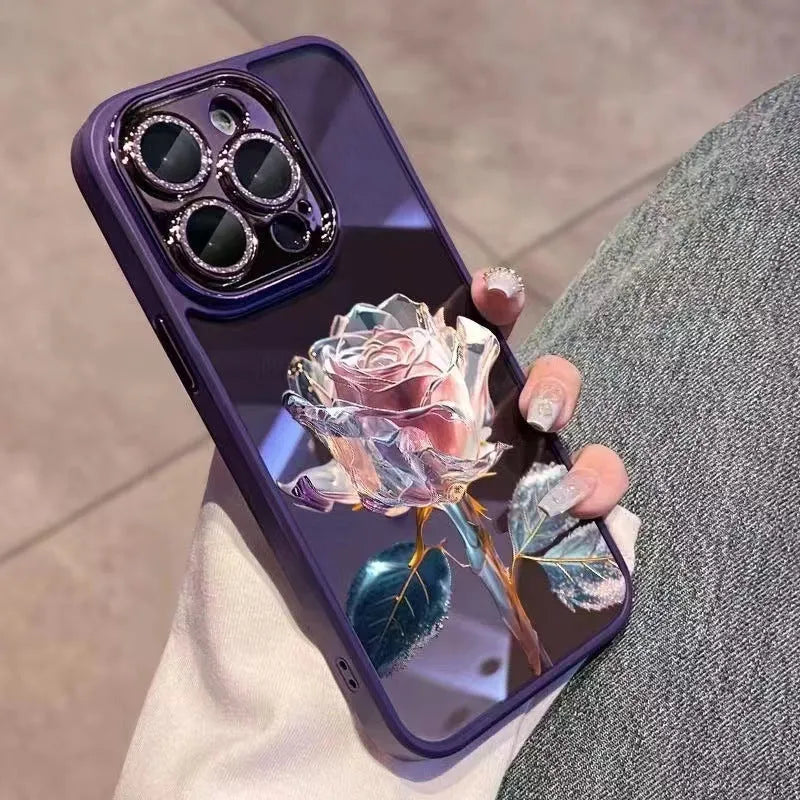 Dark purple TPU phone case with a rose pattern and a sparkly pink lens film for iPhone.