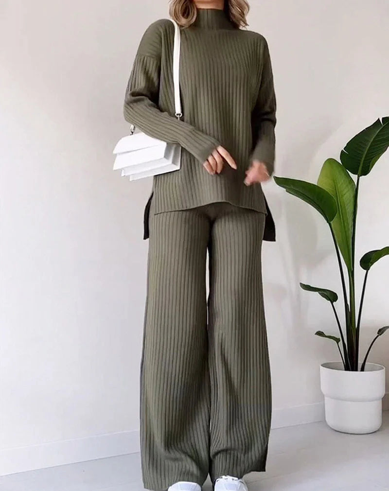 Women's turtleneck knitted suit set with loose split design and straight trousers in white, black, and green