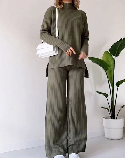 Women's turtleneck knitted suit set with loose split design and straight trousers in white, black, and green