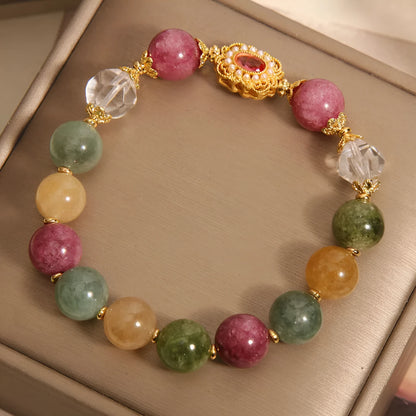 Jade colour tourmaline round bead bracelet for women with alloy inlay and rhinestones on a pearl crystal base.