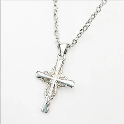 Octagonal star-shaped silver cross pendant necklace with an adjustable chain, a versatile and stylish accessory for women