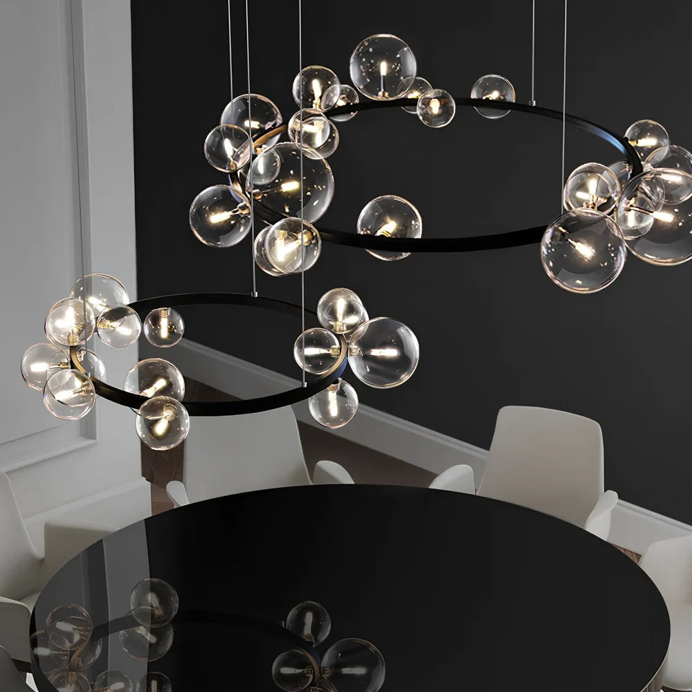 Glass ball chandelier with iron frame in spherical design, showing LED lighting and push-button switch