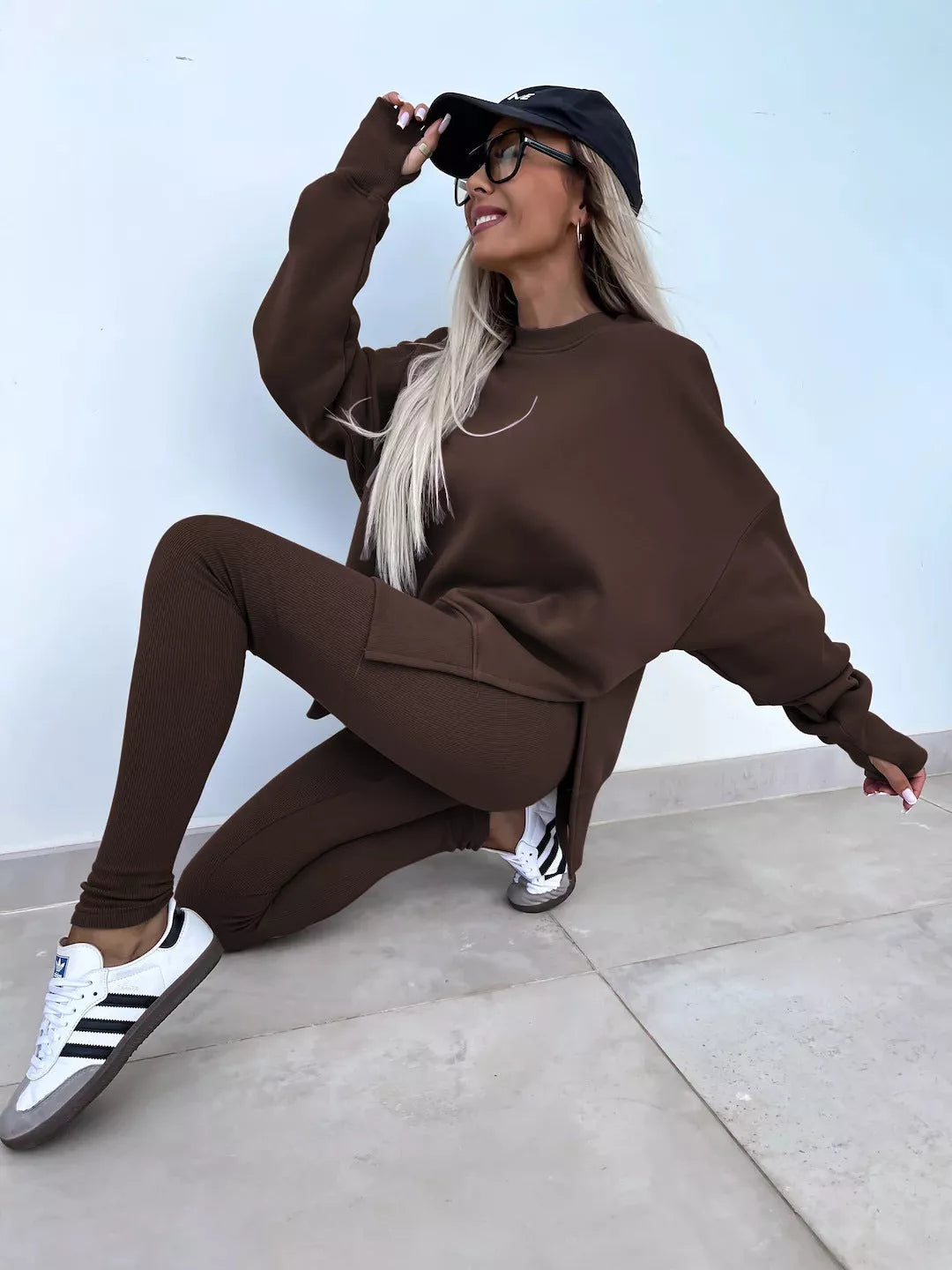 Women's casual sweater suit with long sleeve crew neck top and tight trousers in various colors