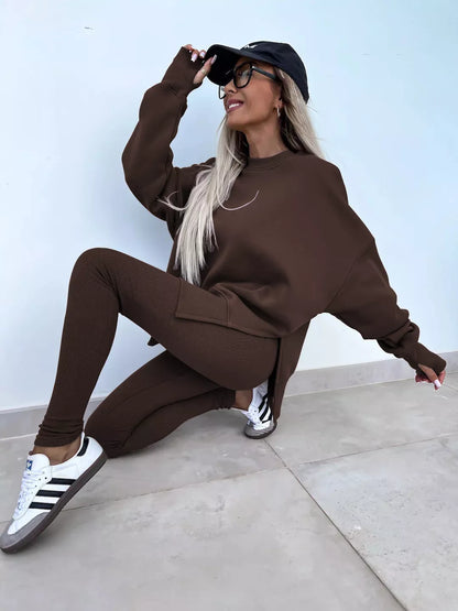 Women's casual sweater suit with long sleeve crew neck top and tight trousers in various colors