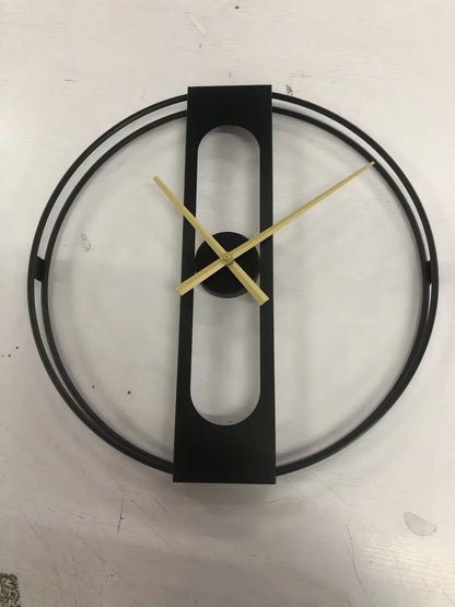 Round metal wall clock with 50cm diameter in black or gold finish showing battery compartment