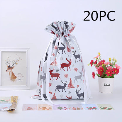 Christmas gift bag with drawstring closure in laser gold finish, 32x24cm dimensions