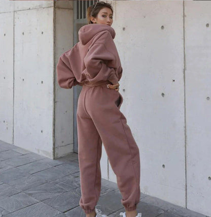 Women's casual hoodie outfit in various colors and sizes, featuring a stylish design and comfortable polyester construction.