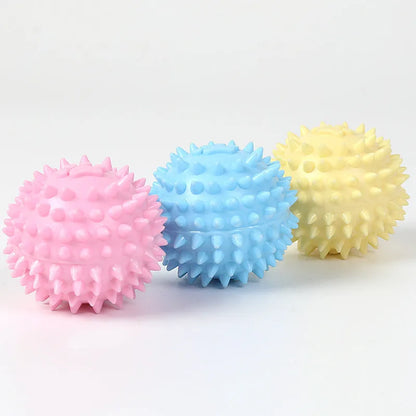 Blue TPR dog chewing toy ball with footprint design and tooth-cleaning bulges