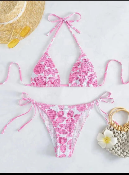 Women's floral halter neck swimsuit set in polyester fabric showing bra top and briefs