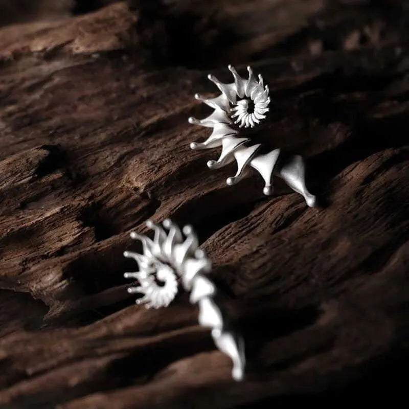 Conch three-dimensional matte stud earrings with irregular shape and electroplated alloy construction