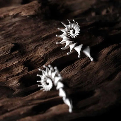Conch three-dimensional matte stud earrings with irregular shape and electroplated alloy construction
