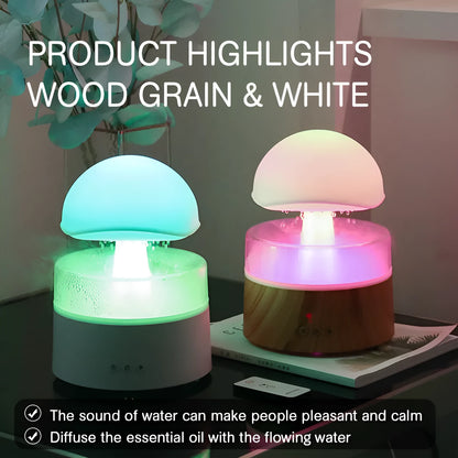 White rain cloud humidifier with falling water droplets and coloured LED lights on nightstand