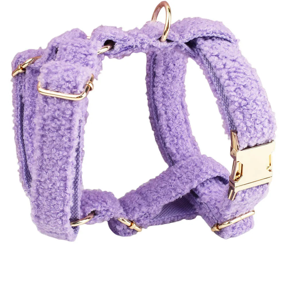 Cloth dog accessory set showing collar, leash, bow, and vest in coordinating fabric