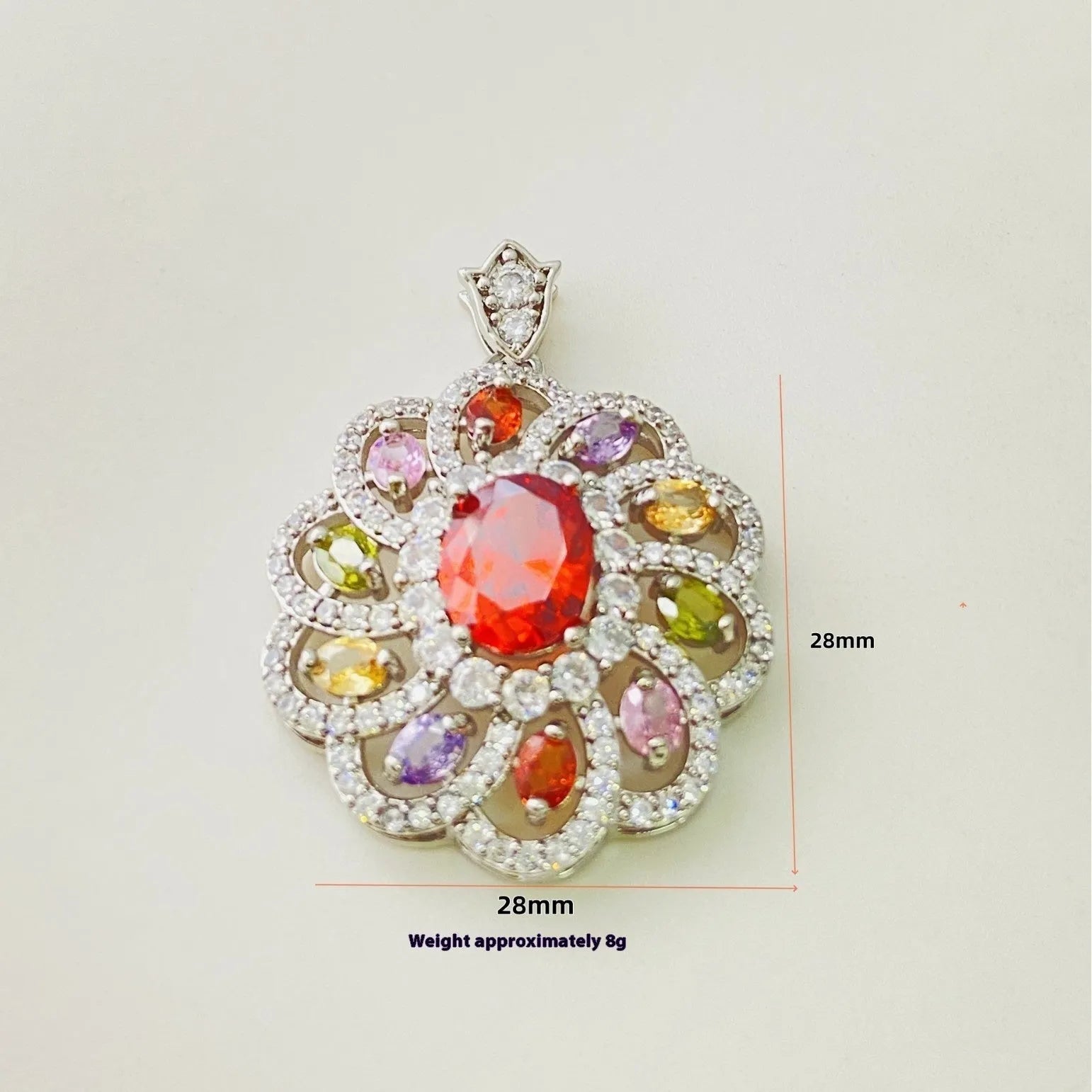 Close-up of a women's gold-coloured flower pendant necklace with a bright zircon stone centre.