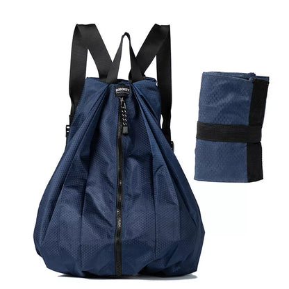 Women's waterproof foldable backpack in navy blue, perfect for outdoor and campus use