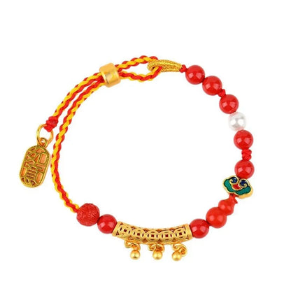 Women's red cinnabar hand-woven rope bracelet with geometric design and bell charm