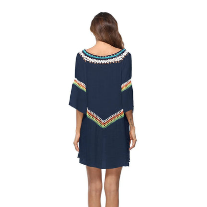 Women's crocheted ethnic style beach cover-up top in apricot colour, for sun protection.