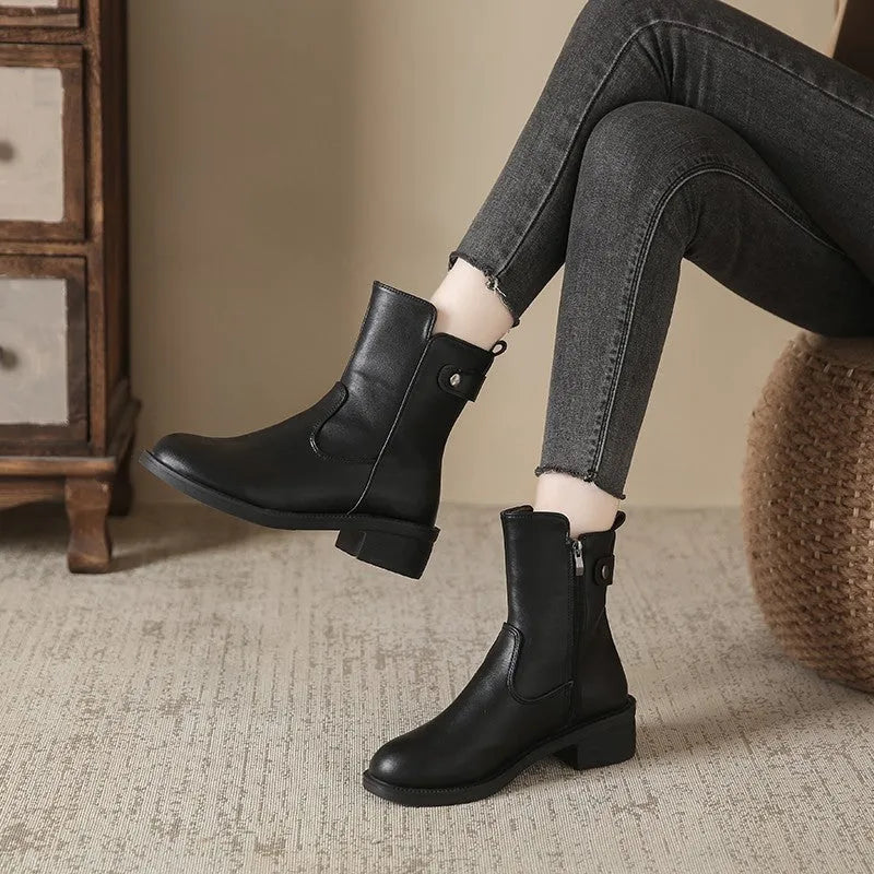 Women's low heel boots with round toe design and side zipper fastening, available in black artificial PU material in sizes 35 to 42 for everyday casual wear