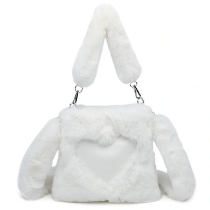 Plush tote bag for women in various colors, including black, brown, white, gray, and pink, with a soft, fluffy exterior and a spacious, versatile design.