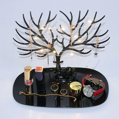 Deer Antler Jewelry Stand in white and black, organizing earrings, necklaces, and bracelets