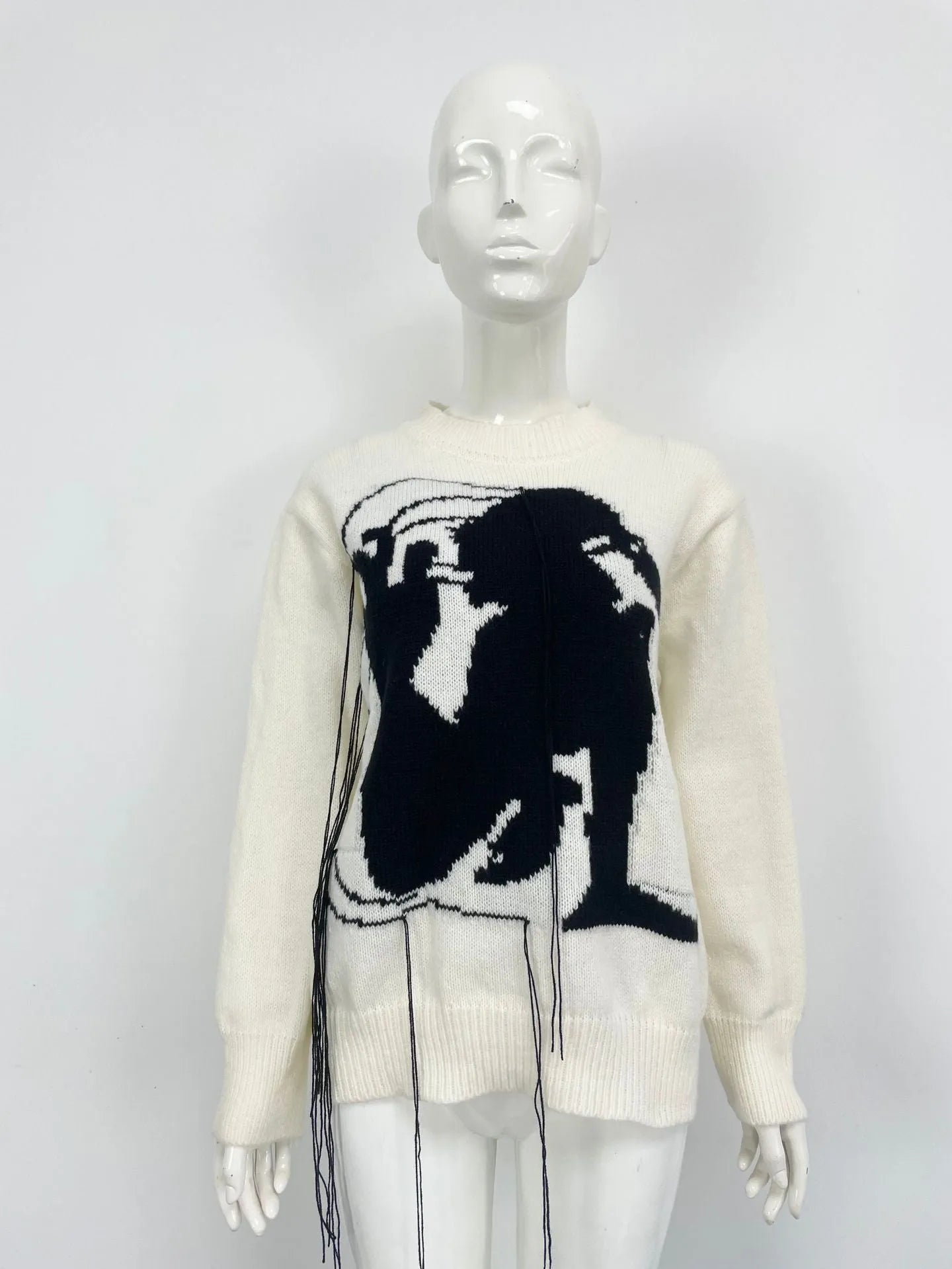 Women's grey alpaca wool sweater with abstract pattern and tassel design on regular sleeves