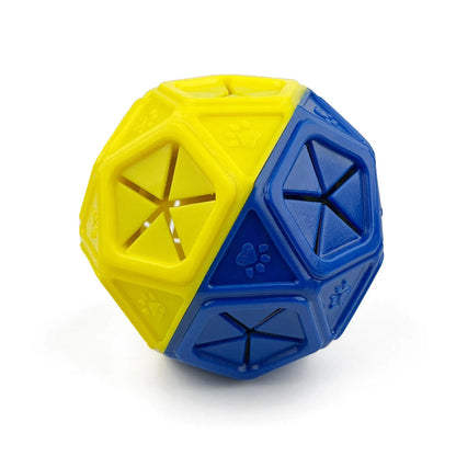 Chew-resistant dog puzzle feeder ball in red colour designed for interactive food dispensing