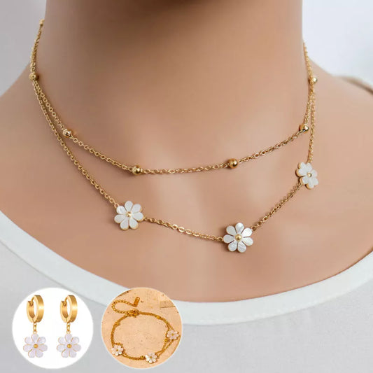 Stainless steel daisy flower jewelry set with necklace, bracelet, and earrings in electroplated gold finish