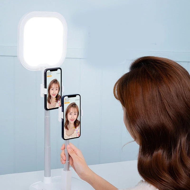 Versatile mobile phone broadcast stand with adjustable height, 360-degree rotation, and dimmable LED fill light for content creation
