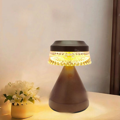 Small modern LED night lamp on a table with USB cable, shown in black, brown, and orange colour options.