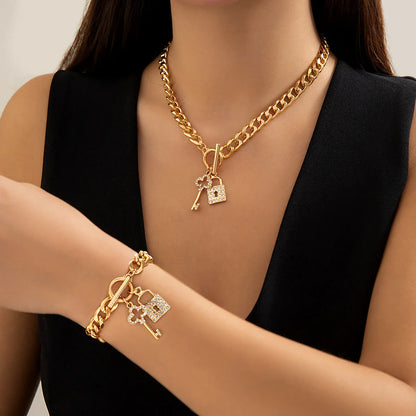 Stylish lock and key pendant necklace with a delicate chain, available in a variety of colors and materials