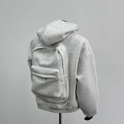 Light grey men's backpack design hooded coat jacket on a hanger.