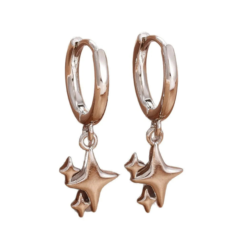 Small star-shaped copper earrings for women in gold or silver, supplied as one pair